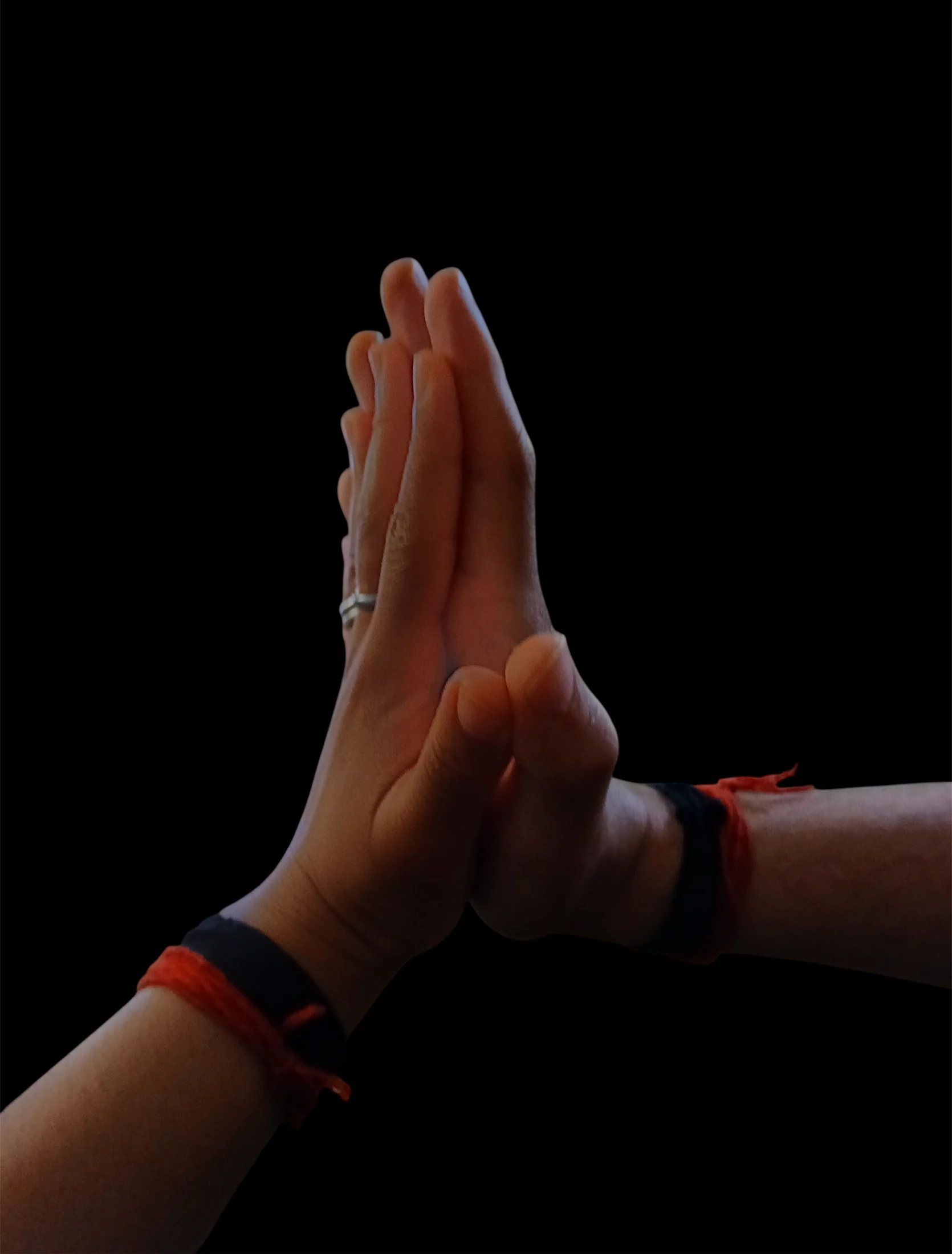 Akshat and Jade joining their hands in a consecrated wedding ritual